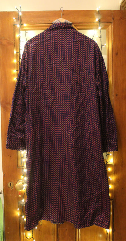 Indigo robe with pink and green embellishments