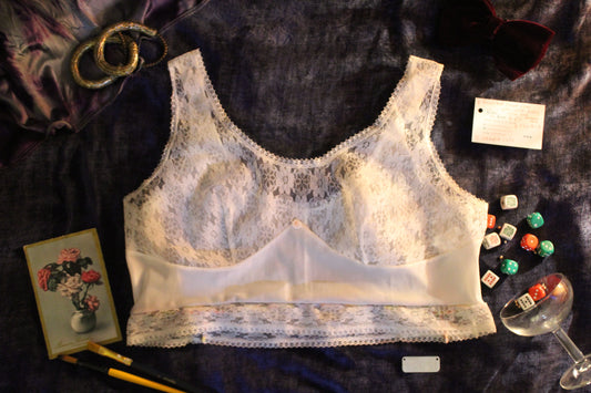 Reworked floral cami with white daisy trim and rainbow hem