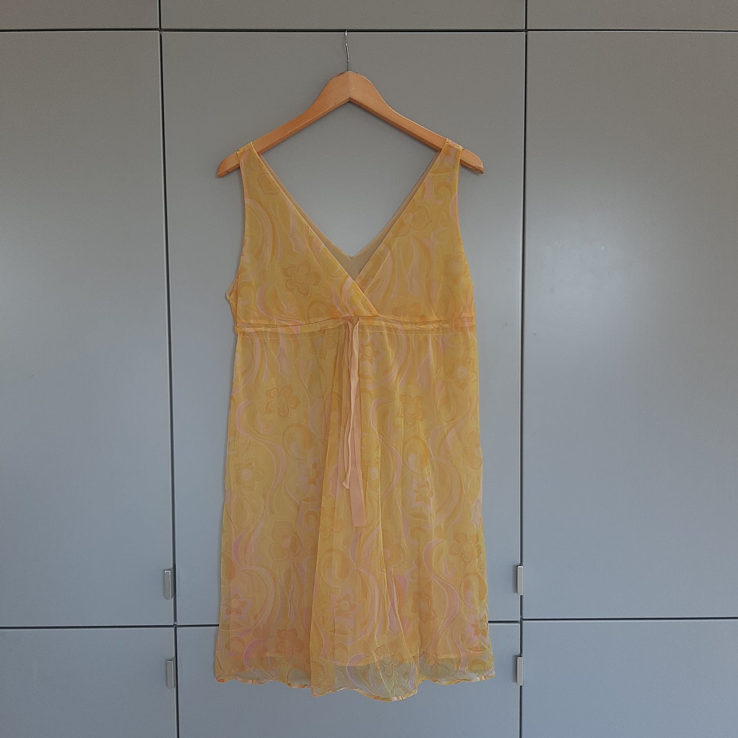 Groovy yellow slip with pink floral pattern