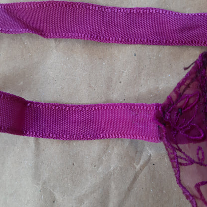 Fuschia slip with floral panels and lettuce edged trim
