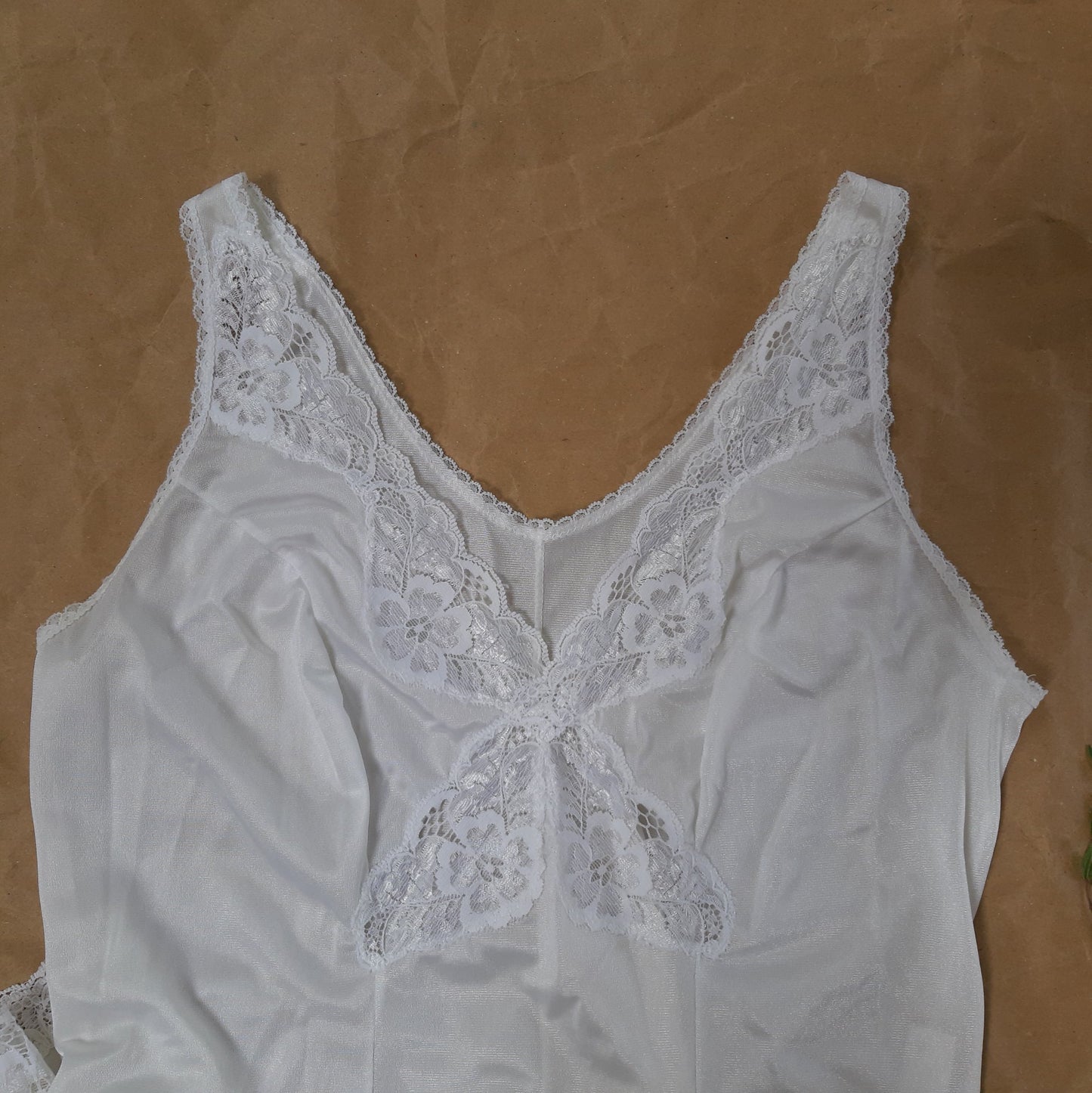 White slip with lace cross