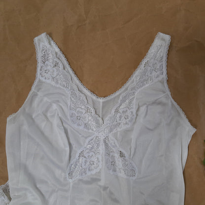 White slip with lace cross
