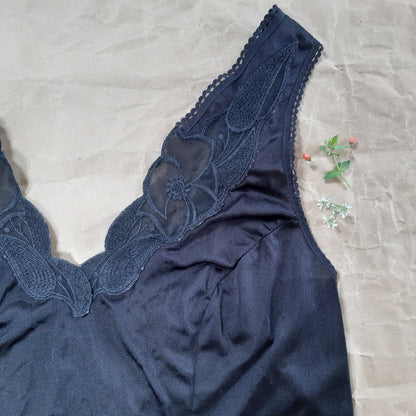 Black slip with woven floral trim