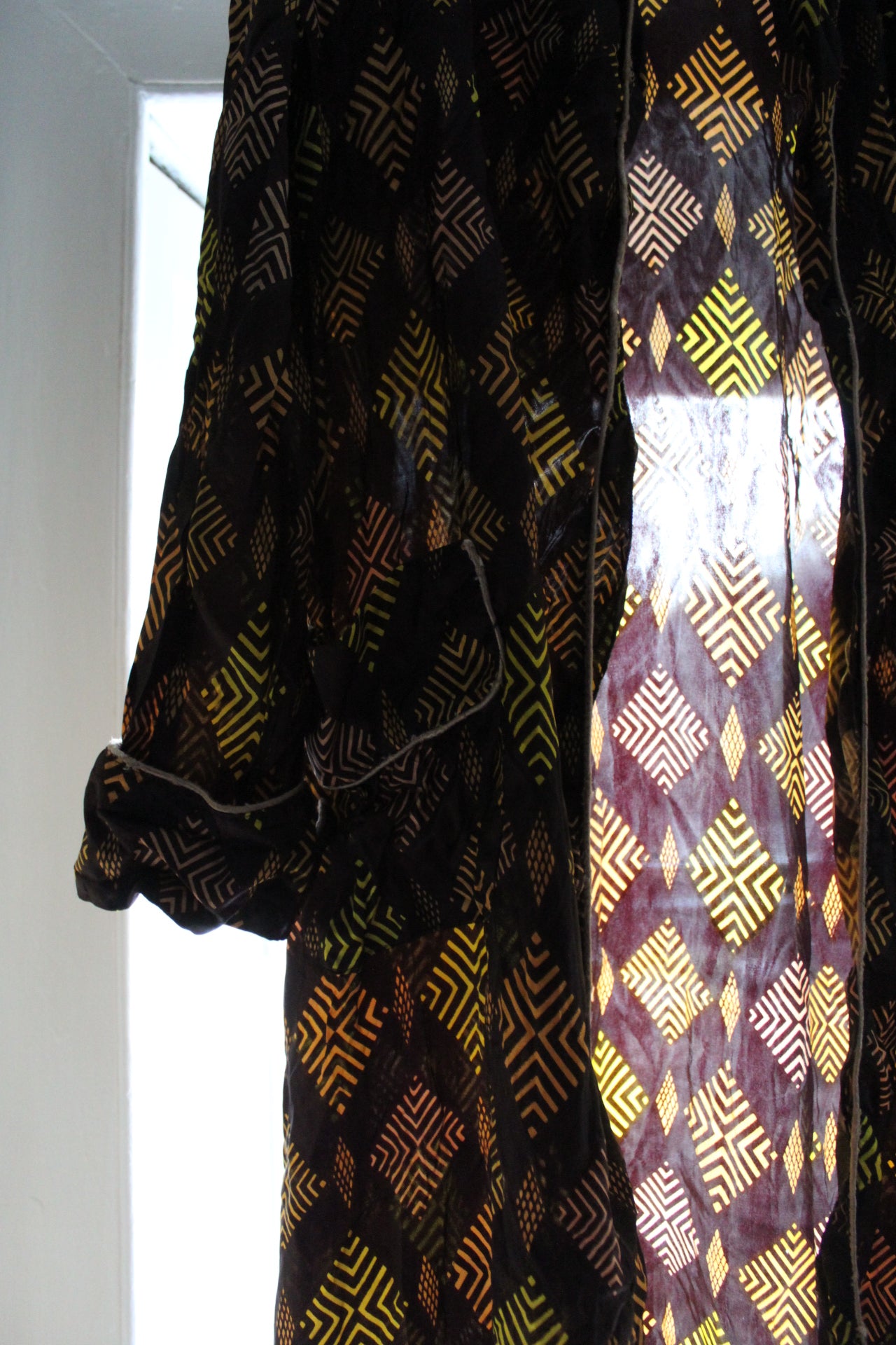 Deep purple robe with amber hexagonical embellishments