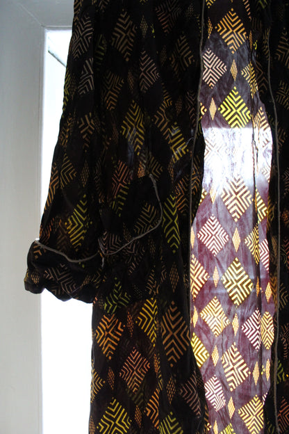 Deep purple robe with amber hexagonical embellishments