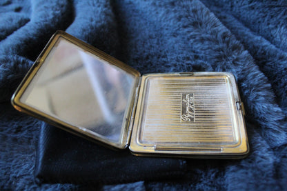 Black vintage compact with stone design