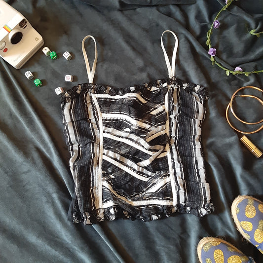 Black and metallic mesh corset