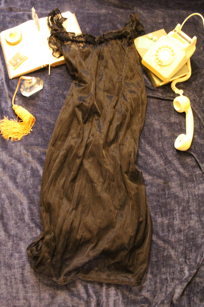 Full length black ruffle gown