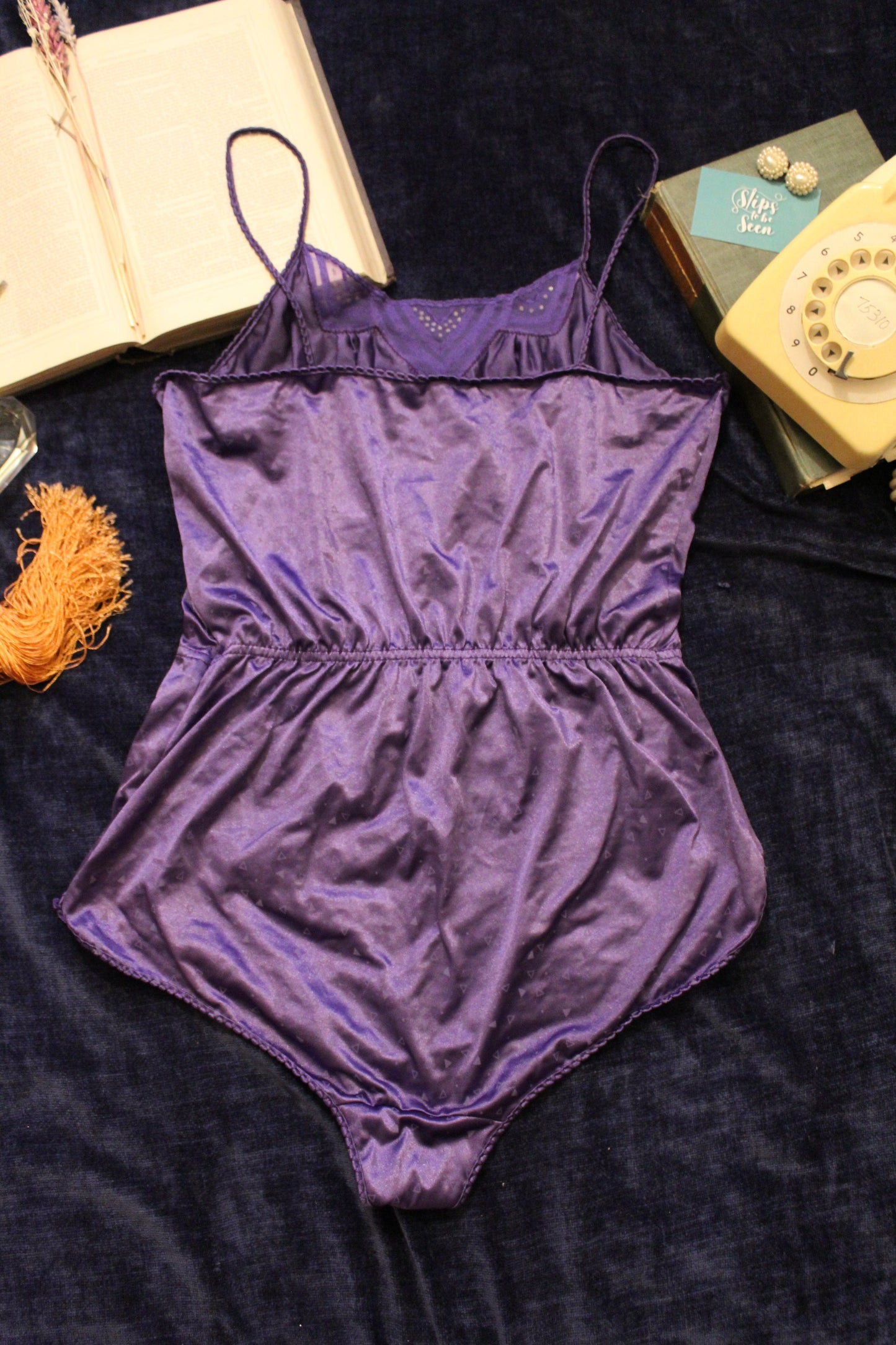 Funky 80's jewelled purple bodysuit