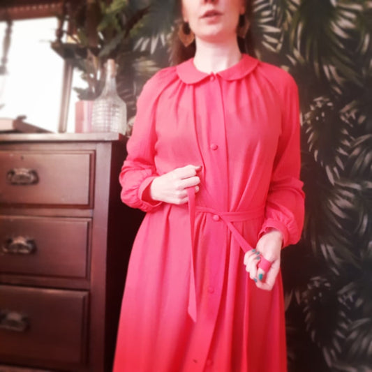 Coral pink robe with button up front and cuffed sleeves