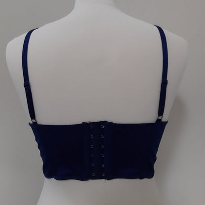 The image shows the back of an 8 Huit blue corset. 
